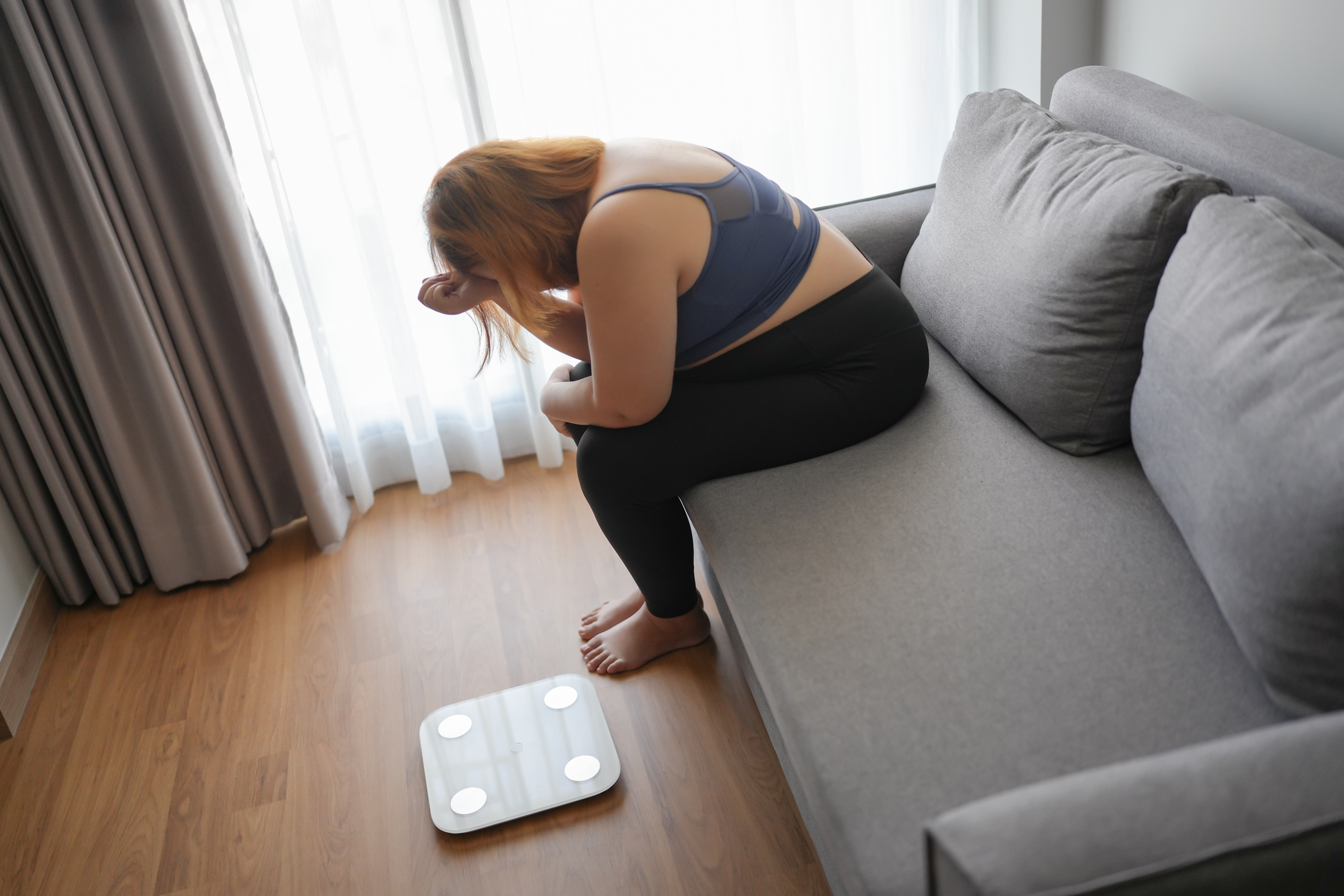 Sad fat woman with fat upset bored of dieting Weight loss failÂ 